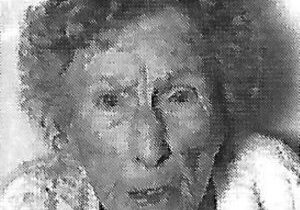 A black and white photo of an old woman.